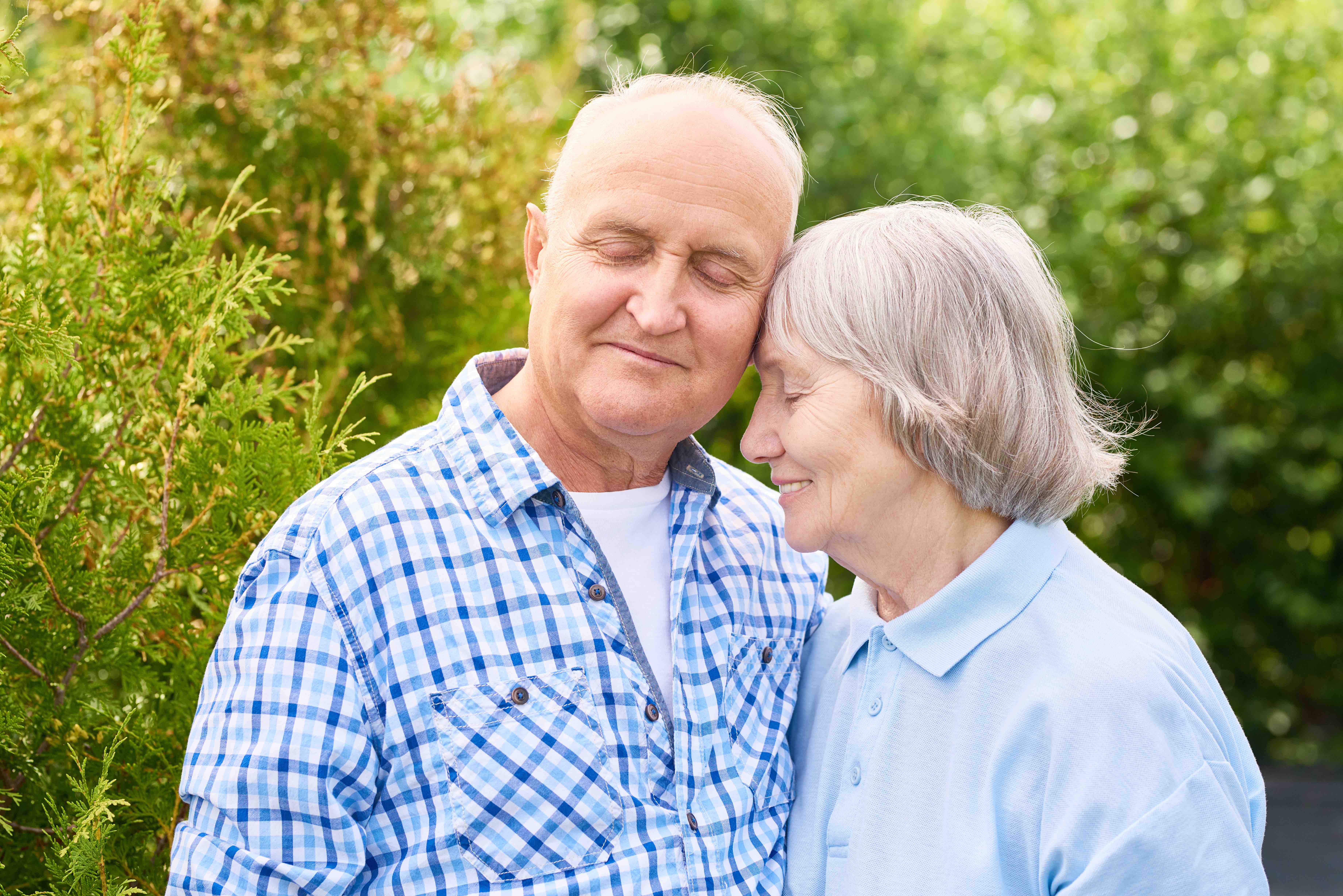 Mature couple embracing.